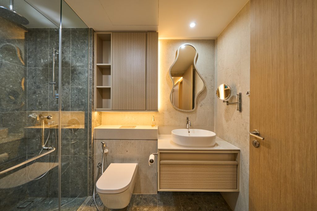 bathroom in guillemard mori showing floating vanity and luxury tiles and inbuilt lighting